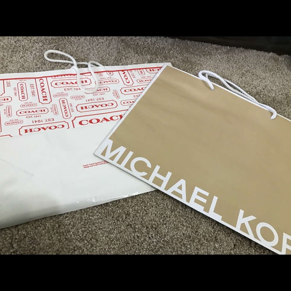 Coach and Michael Kors paper bags and boxes
